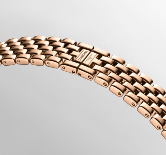 Longines Longines DolceVita L5.200.9.71.6  - задняя крышка золото корпуса, швейцария часы